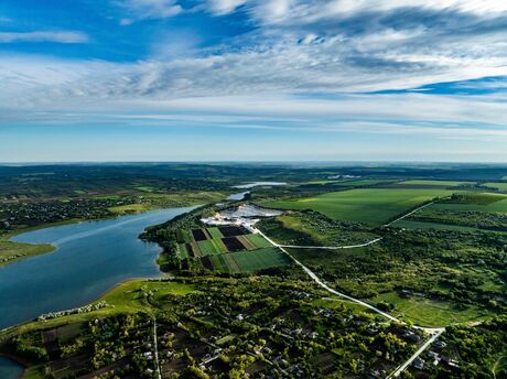 aerial view over Duruitoarea limestone quarry at the prut river shore on the north of moldova during sunset