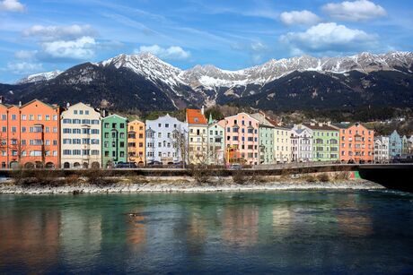 Riverside of Innsbruck at the Inn river with view to the alps